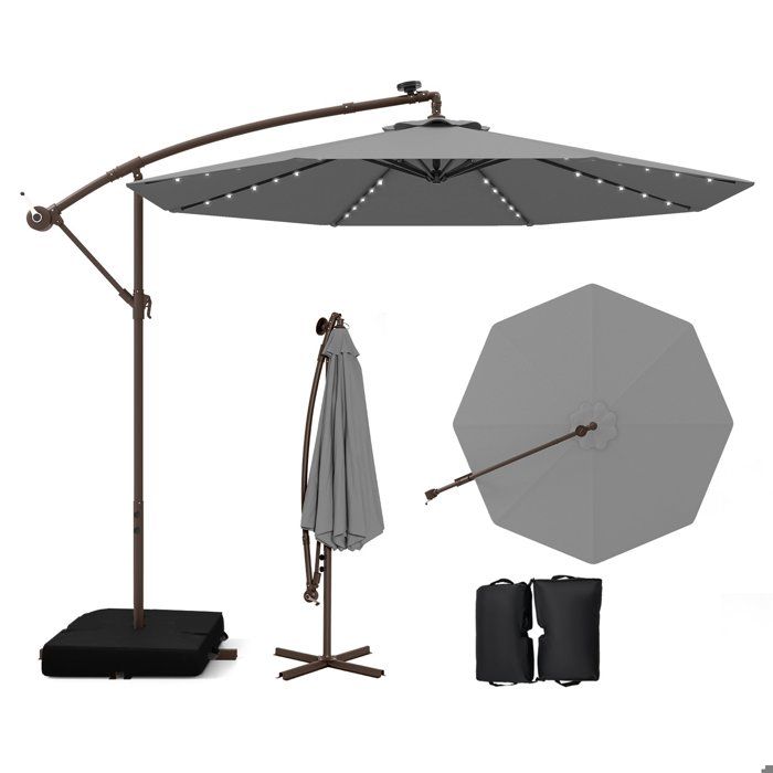 Parasol Déporté 40 LEDs 3M - COSTWAY - Base Croisée Sac de Sable - Tissu Polyester UV 20+ Gris - Panneau Solaire 6 Heures(Beige/3 x 2 m (Rectangle)/Avec LED et avec sac de sable)
